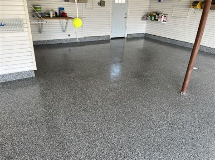 How do you seal a new concrete garage floor?