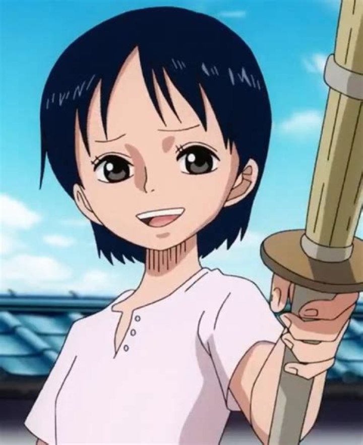 Kuina from One Piece with a sword in front of her face