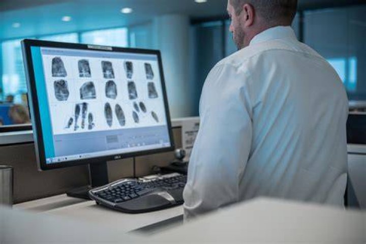 Where do fingerprint examiners work?